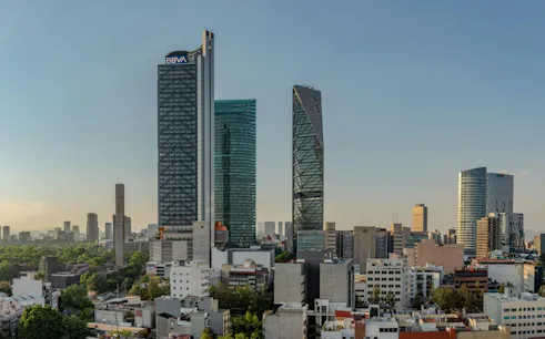 Mexico City skyline with modern skyscrapers along Paseo de la Reforma.