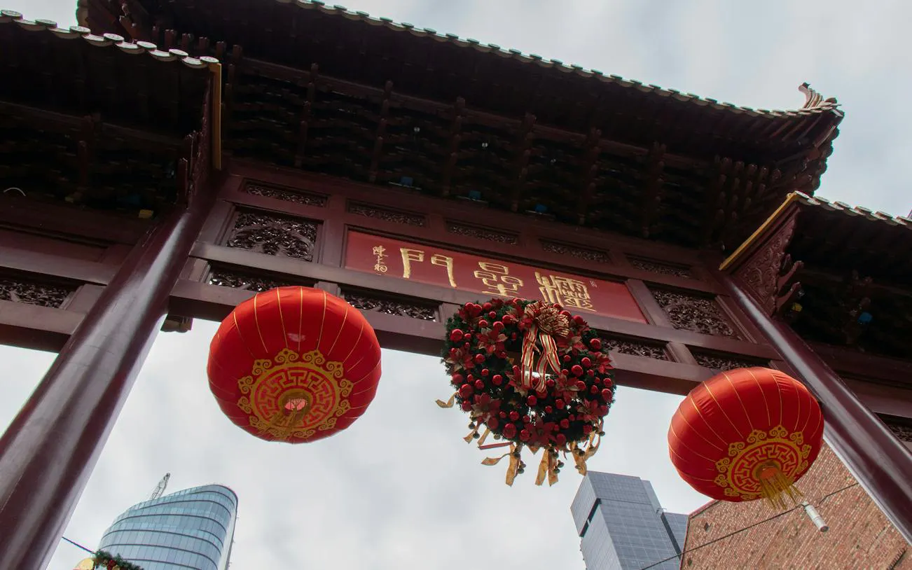 Chinatown archway with red lanterns and wreath, Melbourne Laneways and Arcades tour.