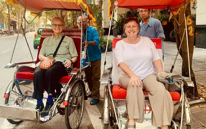 Cyclo riders in Hanoi's Old Quarter during a private tour.