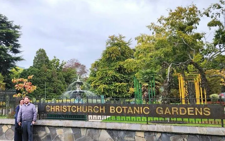 Christchurch Botanic Gardens entrance with fountain and greenery, part of Christchurch City Top Spots Half Day Tour.