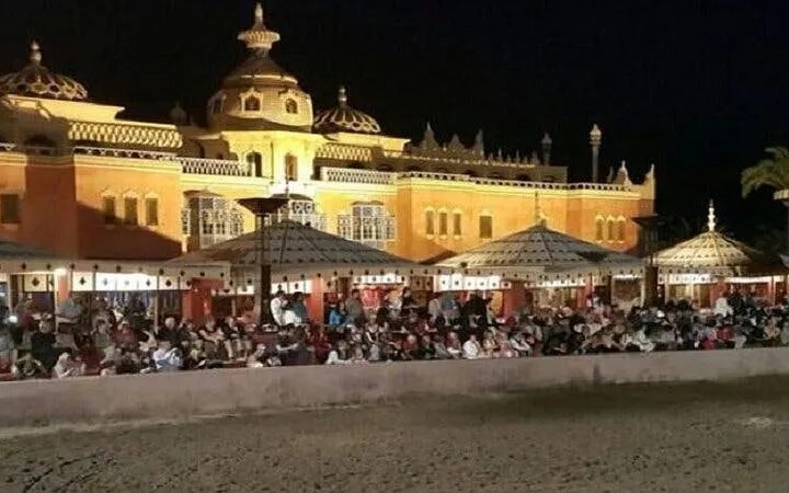 Crowd gathered at Chez Ali for Fantasia night show in Marrakesh.