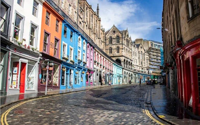 Colorful Victoria Street in Edinburgh, part of the self-guided city exploration game.