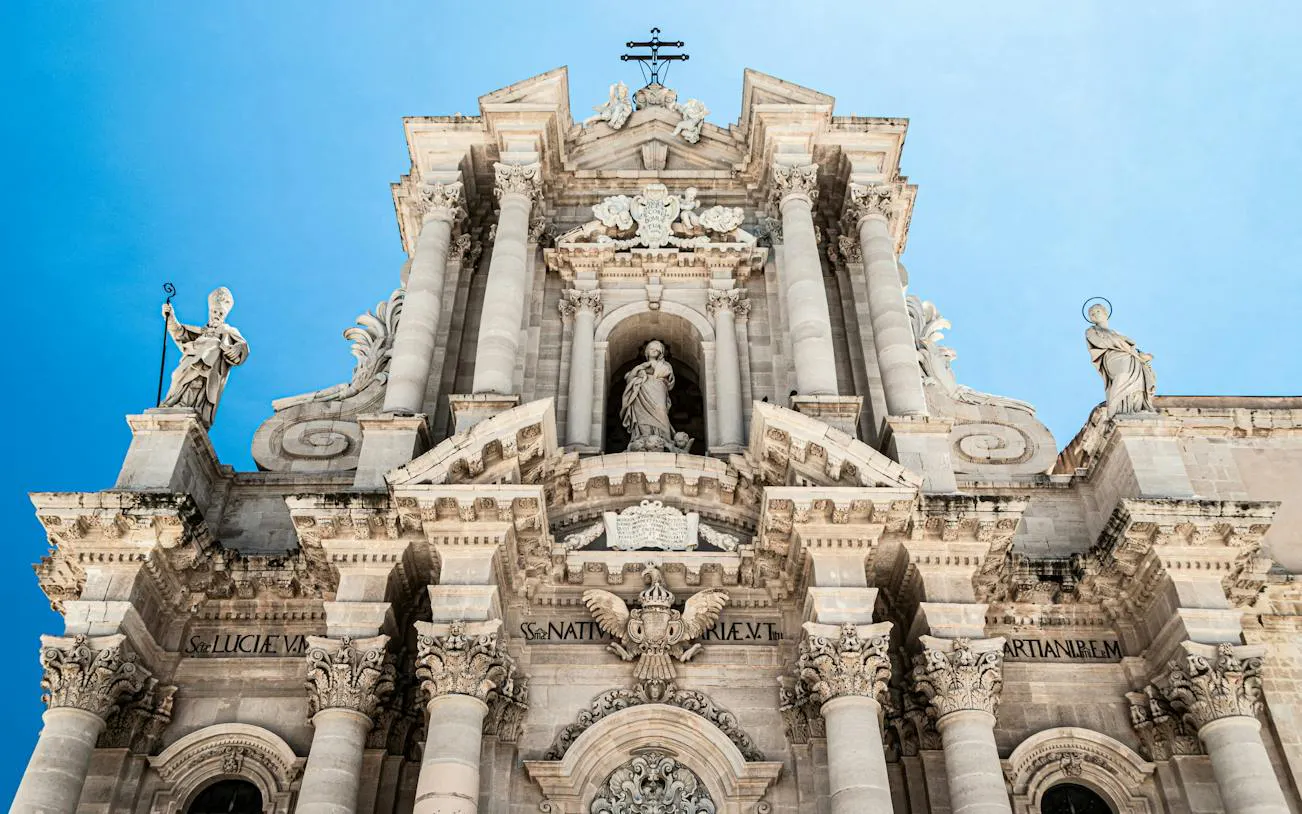 Greek-Temple Cathedral facade with statues, Ortigia Siracusa.