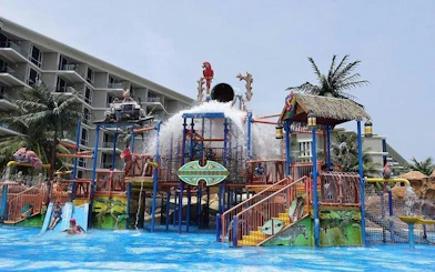Splash Jungle Water Park play area with water slides and splash bucket, Phuket.