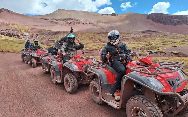 ATV riders exploring Rainbow Mountain and Red Valley near Cusco.