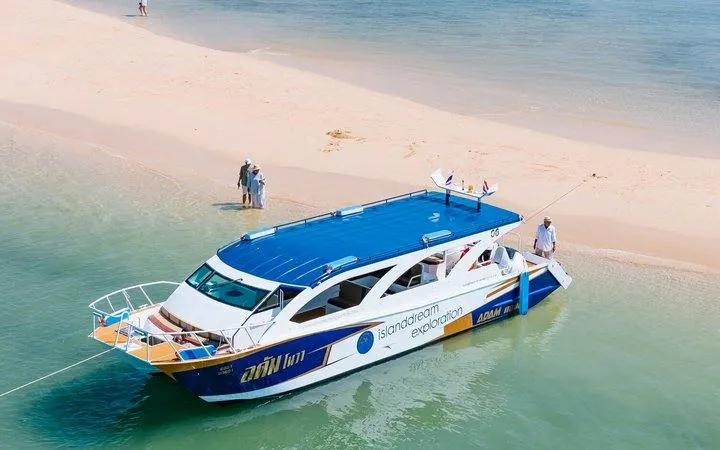 Catamaran anchored at a sandy beach during Phi Phi and Maya Bay Islands tour from Khao Lak.