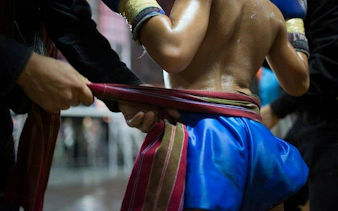 Muay Thai fighter preparing for match at Thapae Stadium, Chiang Mai.