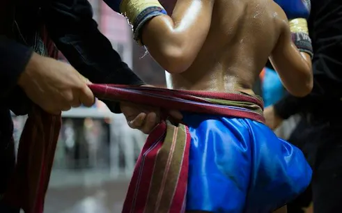 Muay Thai fighter preparing for match at Thapae Stadium, Chiang Mai.