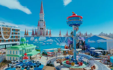 The Land of Legends Theme Park with colorful rides and castle-like structures.