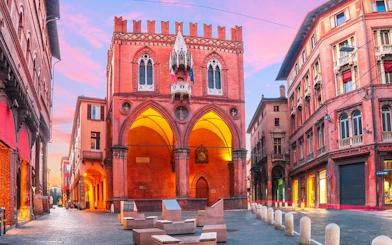 Bologna Palazzo Re Enzo at sunset on self-guided walking tour.