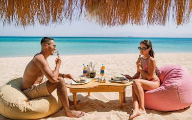 Couple dining on a beach during a private speedboat trip to Hula Hula Island, Hurghada.