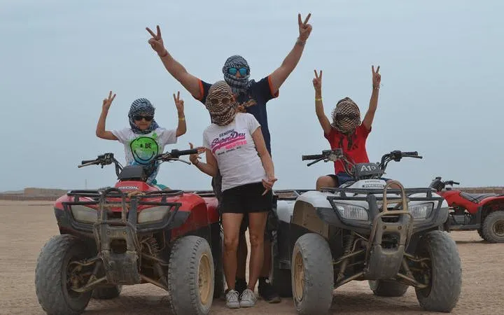 Group on quad bikes during desert safari in Sharm El Sheikh.