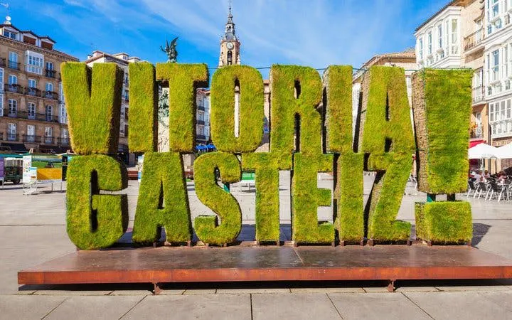 Vitoria-Gasteiz city sign made of greenery in a public square, Spain.