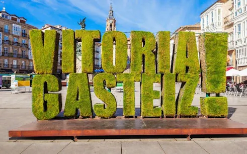 Vitoria-Gasteiz city sign made of greenery in a public square, Spain.