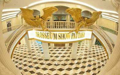 Colosseum Show Pattaya entrance with golden statues, Pattaya.