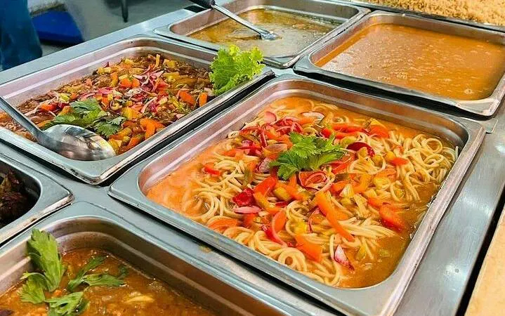 Buffet lunch with pasta and vegetables on Santo Domingo tour, Punta Cana.