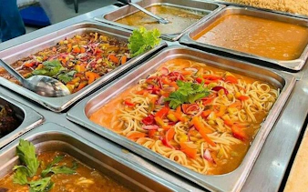 Buffet lunch with pasta and vegetables on Santo Domingo tour, Punta Cana.
