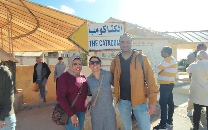 Visitors at the entrance to the Catacombs in Alexandria during a private tour.