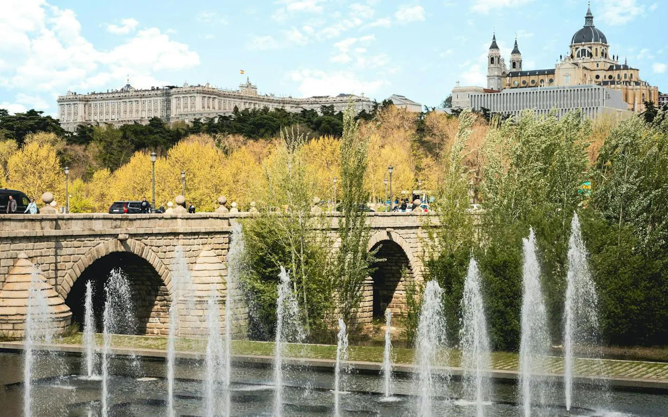 Puente de Segovia with fountains in foreground, Madrid Río, Madrid.