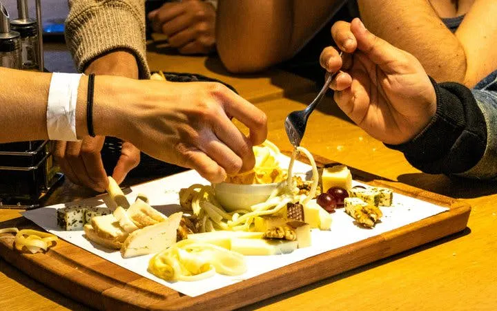 Bratislava food tour with local guide featuring traditional Slovak cheese platter.