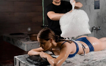 Turkish bath with foam massage in Sharm El Sheikh spa.