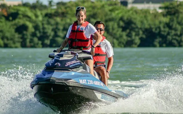 Jet ski ride on water with two people wearing life vests, Marrakesh.