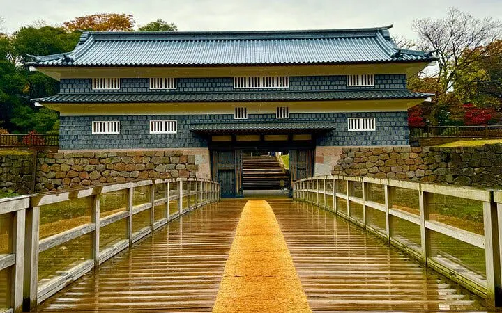 Kanazawa Castle entrance with wooden bridge, Japan.
