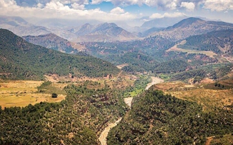 Atlas Mountains landscape with lush valleys and Berber villages near Marrakesh.