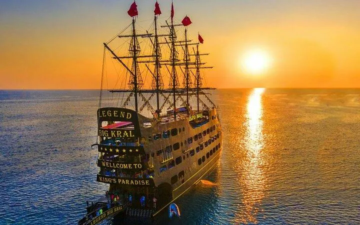 Pirate ship at sunset on Alanya's coast, part of the Last King Alanya Pirate Boat Trip.