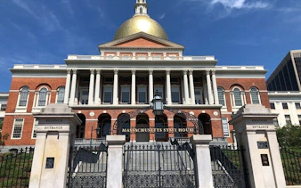 Massachusetts State House with golden dome in Boston, part of self-guided city exploration game.