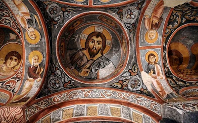 Cappadocia museum ceiling with religious frescoes, part of private guided tour.