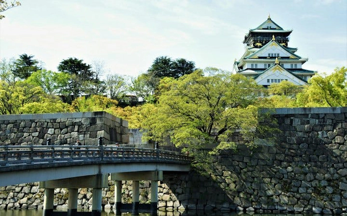 Bridge and stone walls leading to the Imperial Palace East Gardens in Tokyo.