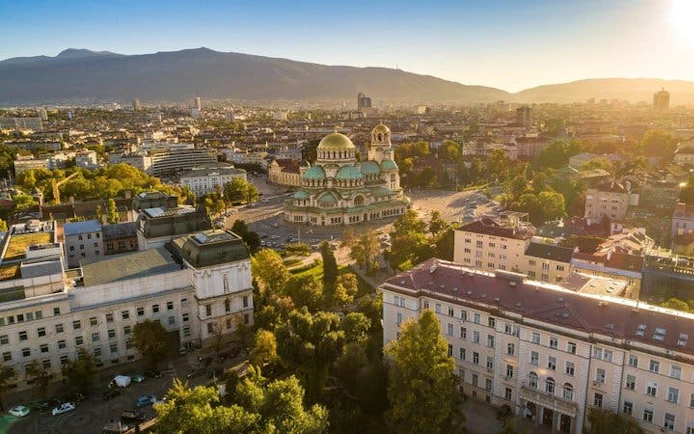 Alexander Nevsky Cathedral in Sofia with Vitosha Mountain in the background.