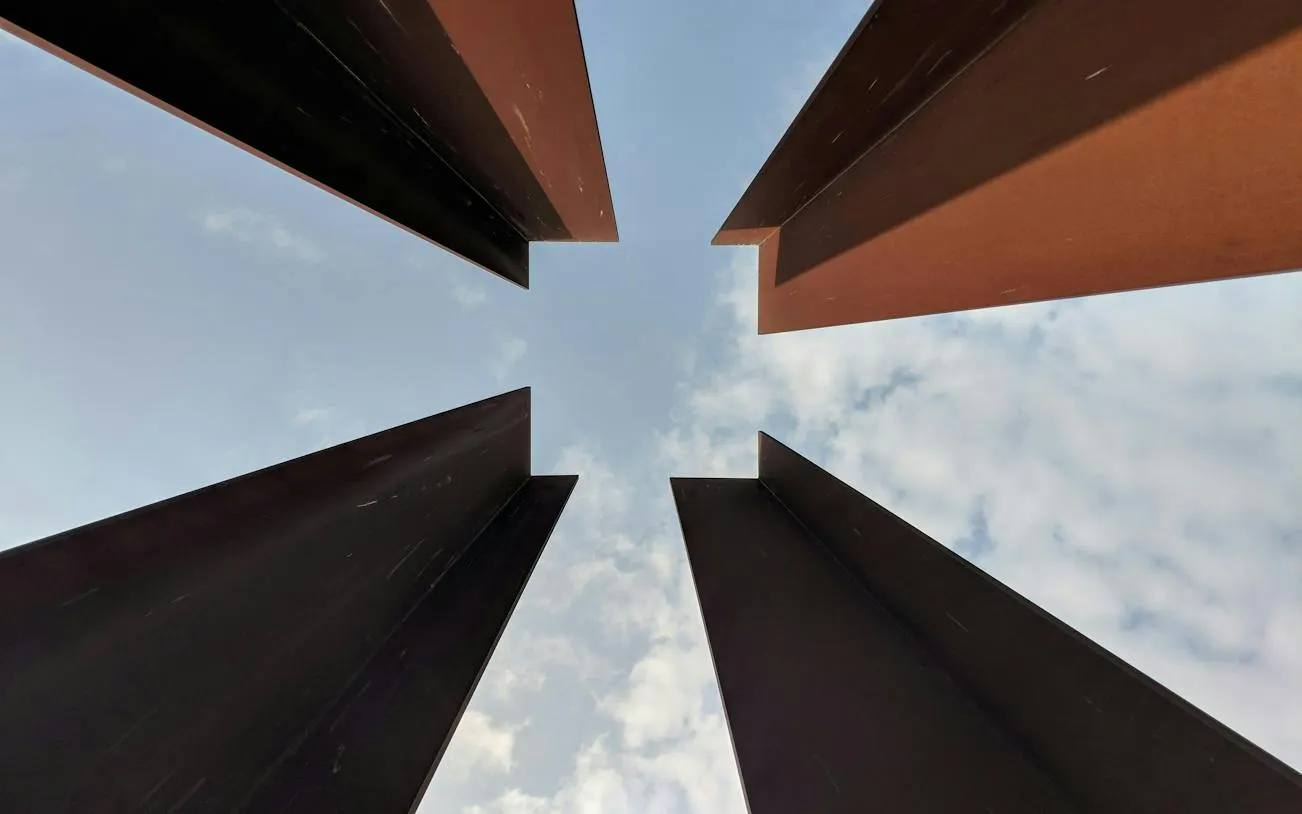 Steel beams at Berlin Wall Memorial against the sky, Bernauer Strasse, Berlin.
