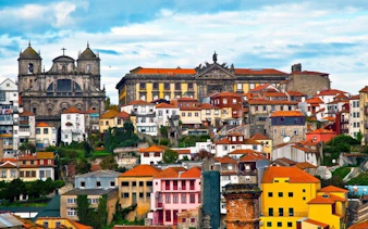 Porto cityscape with colorful buildings and historic architecture, featured in self-guided walking tour app.