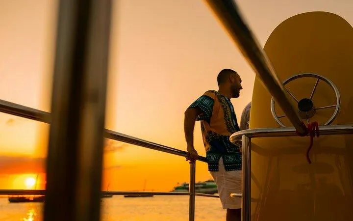 Semi-submarine cruise at sunset in Zanzibar with a view of the ocean and horizon.