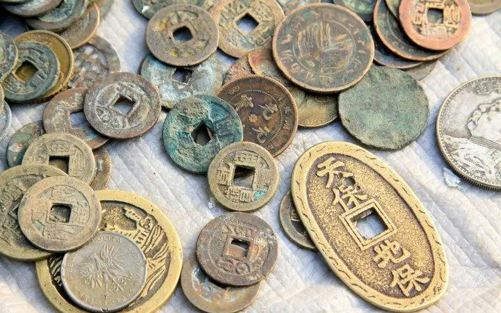 Ancient Japanese coins used in Tokyo coin ring-making workshop in Asakusa.