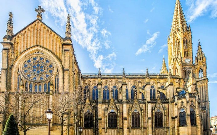 San Sebastian Cathedral exterior on a sunny day, part of self-guided walking tour.