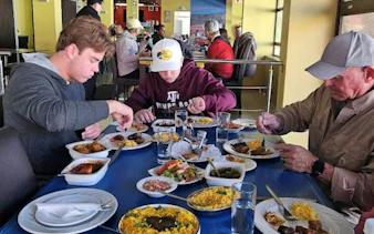 Dining experience on Cape Town food tour with local dishes and cultural tastings.