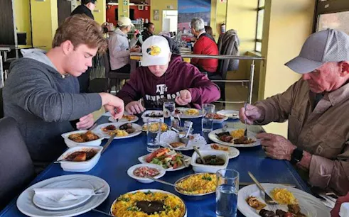 Dining experience on Cape Town food tour with local dishes and cultural tastings.
