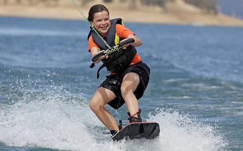 Water skiing in Sharm El Sheikh with glass boat viewing in the background.