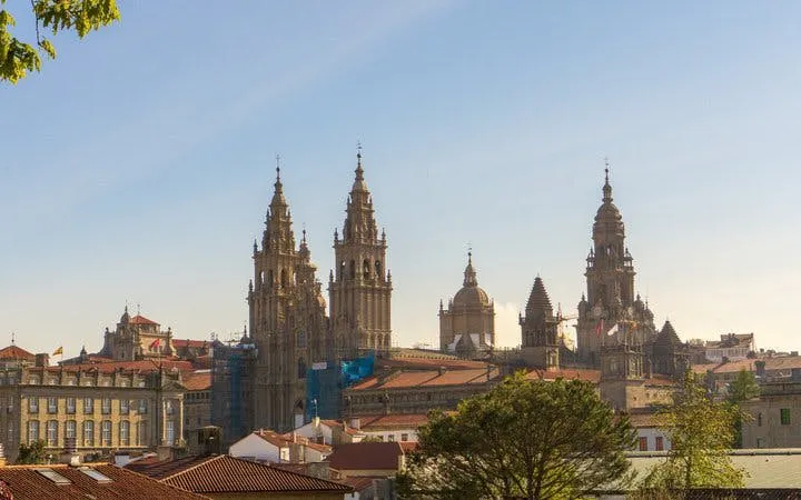 Santiago de Compostela Cathedral skyline on a clear day, view from a self-guided walking tour.