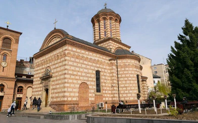 Stavropoleos Monastery in Old Town Bucharest, part of self-guided city exploration game.