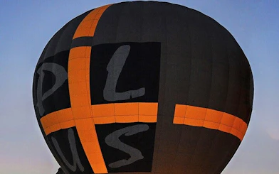Hot air balloon preparing for sunrise flight over Cappadocia.