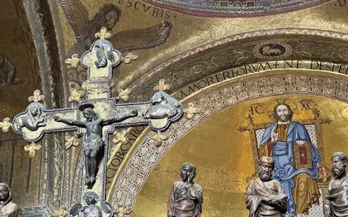 St Mark's Basilica interior with religious mosaics and crucifix, Venice guided tour.