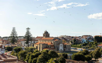 Historic church and rooftops in Porto's historic center during a self-guided audio walking tour.