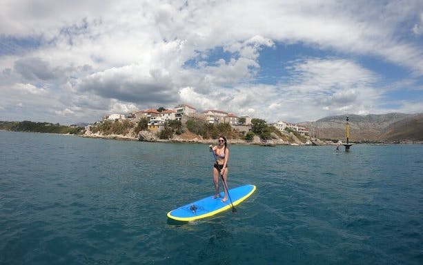 split stand-up paddleboarding tour across sea, river, and mountain landscapes-2