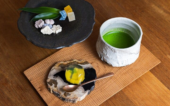 Kintsugi workshop treats with matcha tea and traditional Japanese sweets in Shibuya.