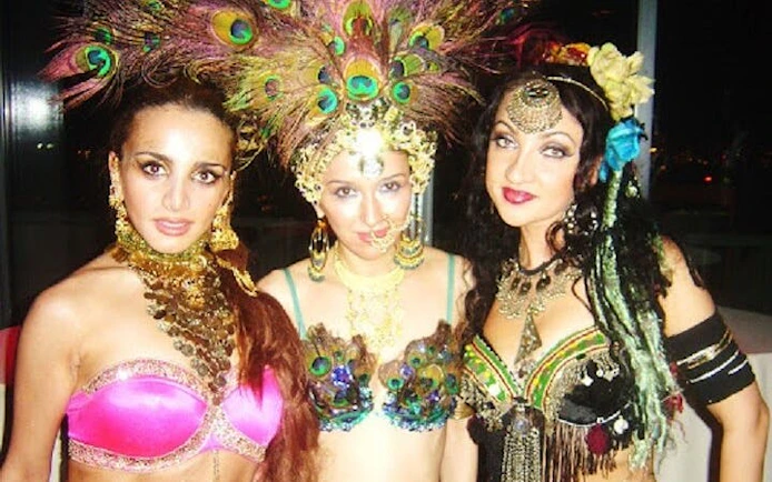 Cabaret performers in vibrant costumes at Hot Nights Live, Hurghada.