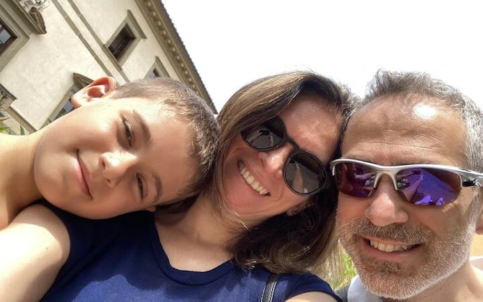 Family enjoying a sunny day in Pisa during a self-guided city exploration game.
